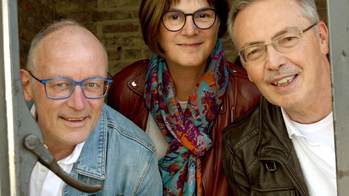 Gruppenbild mit 3 Musikern