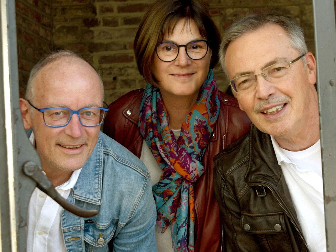 Gruppenbild mit 3 Musikern