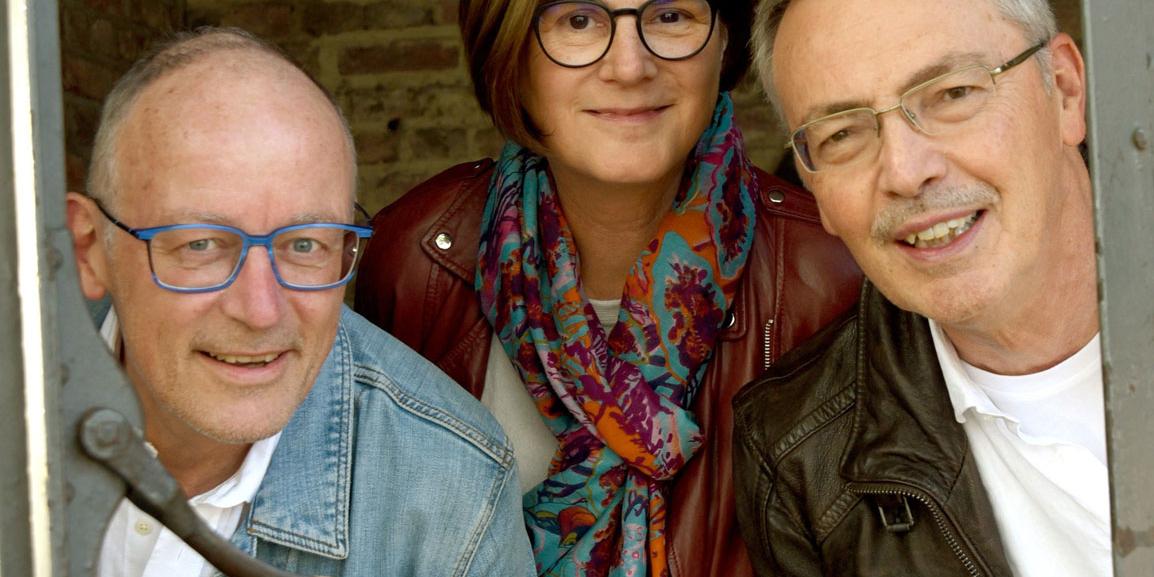 Gruppenbild mit 3 Musikern